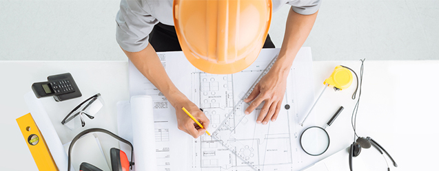 Civil engineer reviewing plans